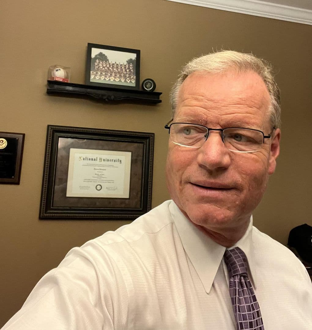 A picture of Darren in his office.